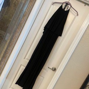 Brand new black pant cotton jumper, open back tie, neck.